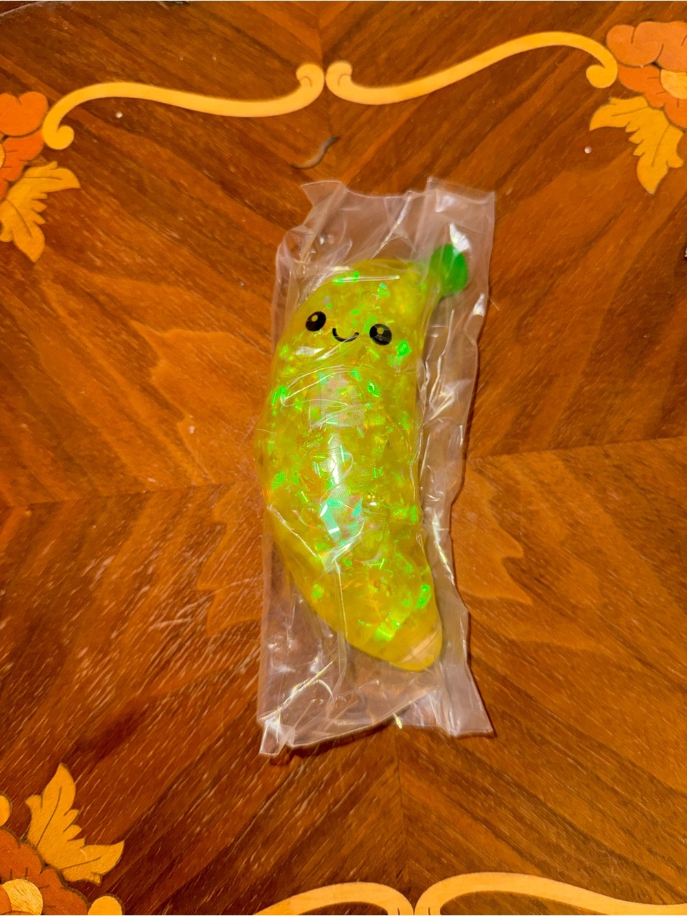 Yellow banana squishy Toy with Smiling Face